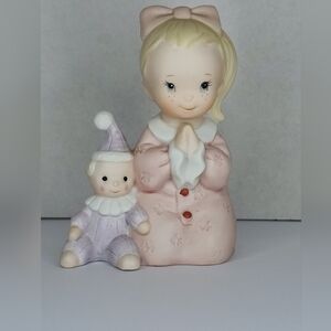 Adorable Figurine with Child and Doll